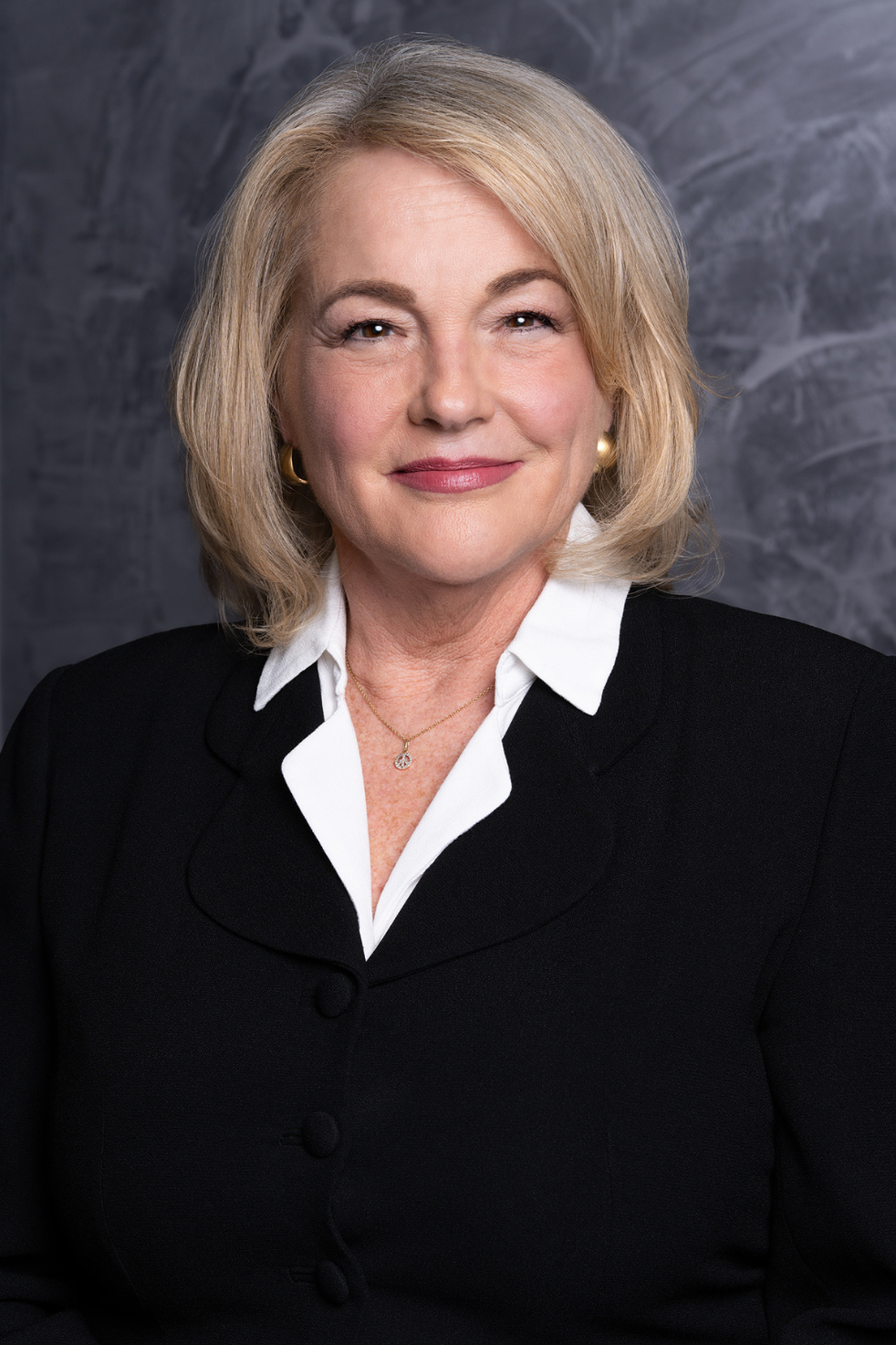 Business and lawyers discussing contract papers with brass scale